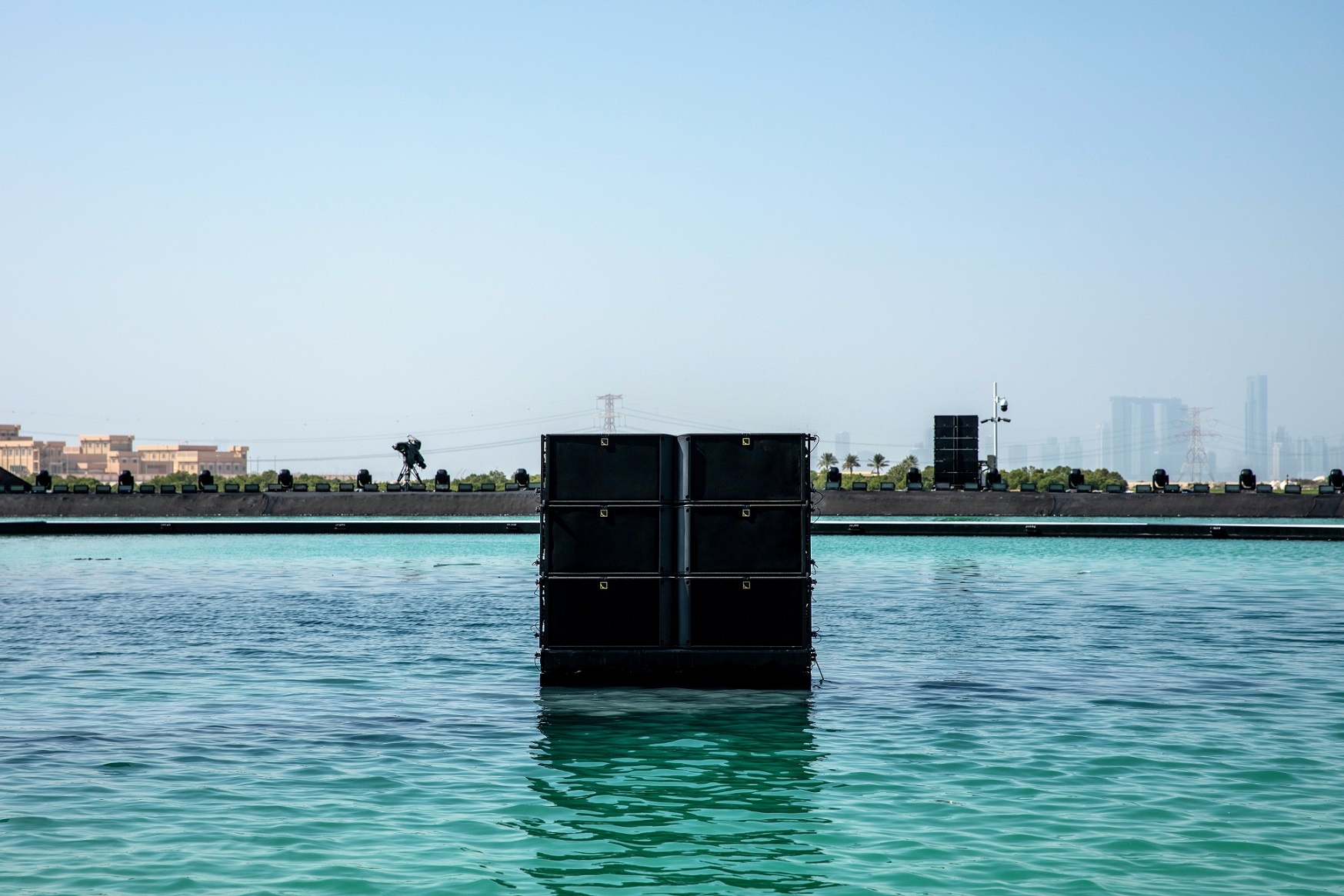 Cube designed as two arrays of L-Acoustics K2 to enhance the view of the spectacular 15m cube for 49th UAE National Day official ceremony, at Al Jubail Mangrove Park, Abu Dhabi, United Arab Emirates