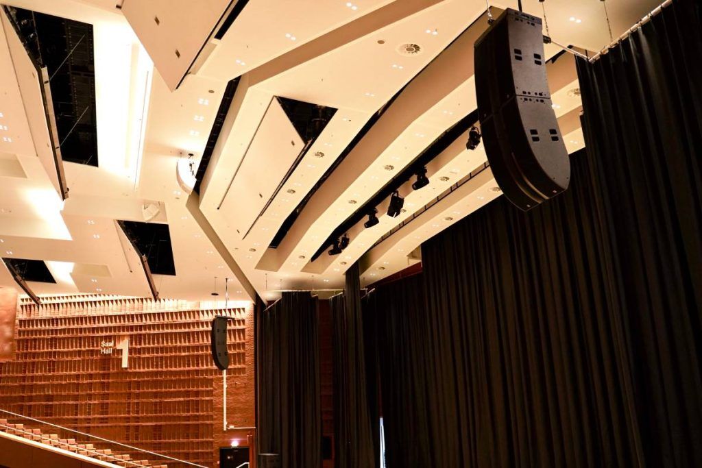 The L-Acoustics L Series professional sound system is complemented by a centre cluster of one A10i Focus over two A10i Wide speakers and four KS21 subwoofers per side.