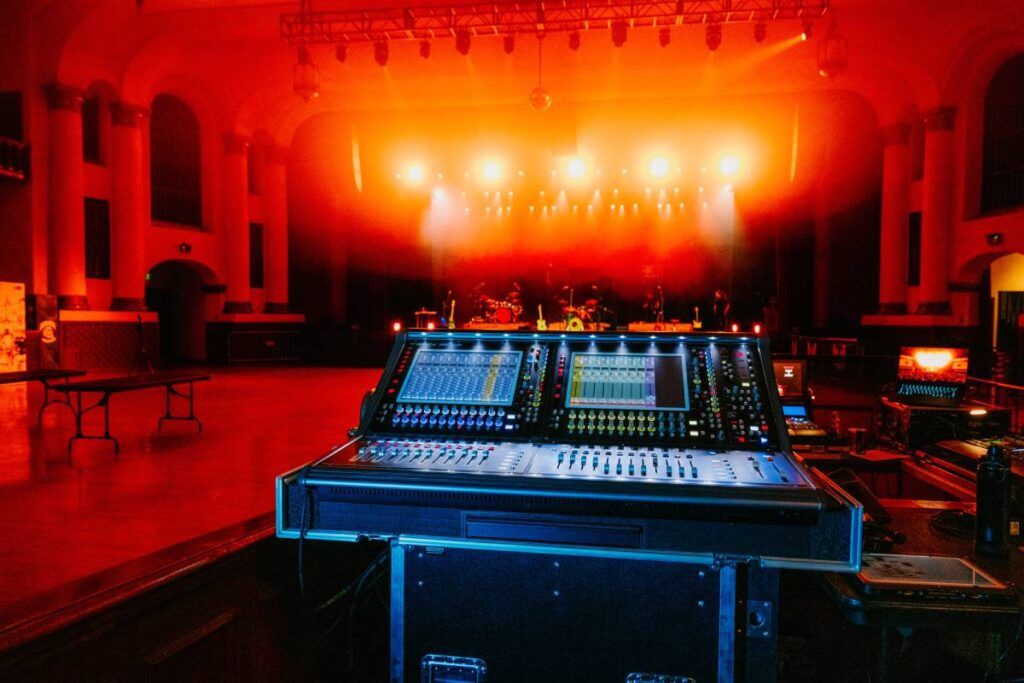 RMA’s new DiGiCo SD12 FOH mixing console with the L-Acoustics L2/L2D arrays silhouetted in the background (photo credit: Heather Koepp)