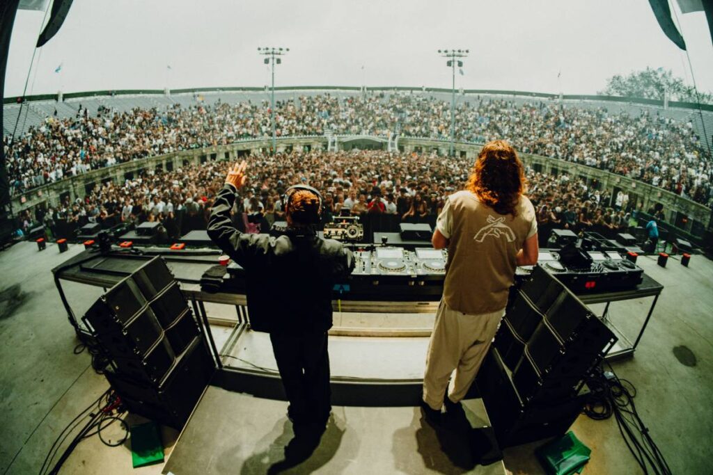 EDM duo JOY (Anonymous) using L-Acoustics “Texas headphones” – three Kara II over a single SB18 per side – as DJ booth monitors (photo credit: Mike Kim)