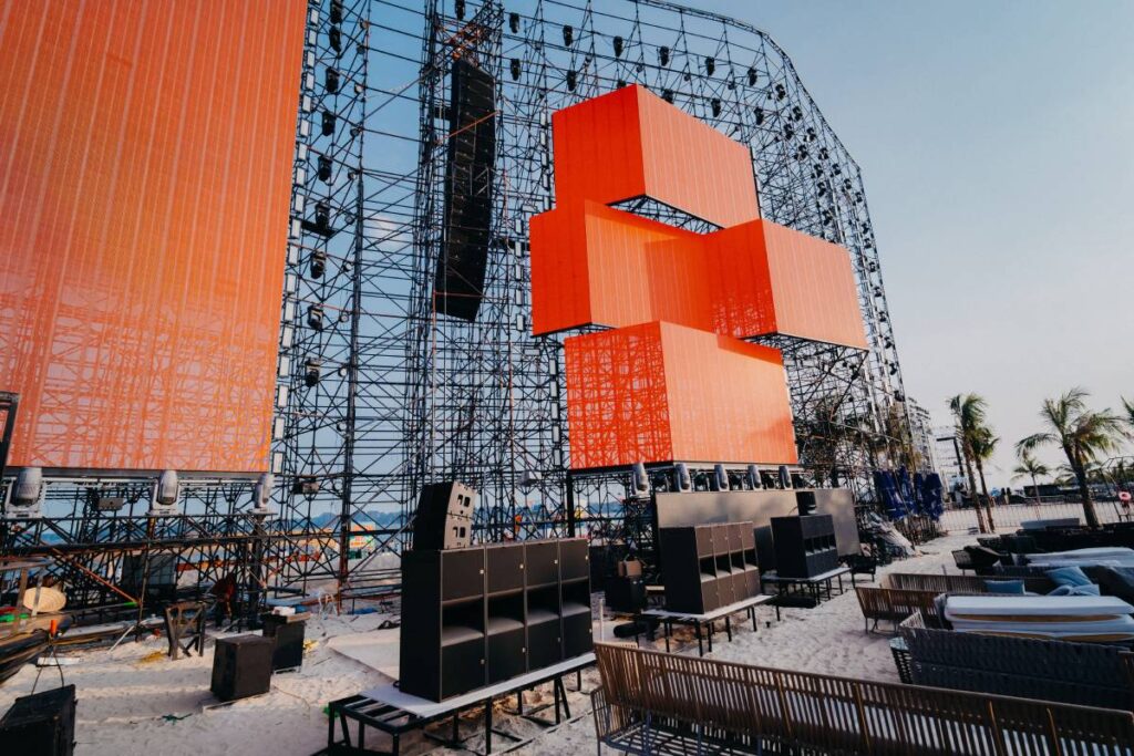 Strategic placement of L-Acoustics A10 Wide speakers atop KS28 subwoofer ground stacks delivers the massive low-end impact essential for contemporary EDM programming at Valley Beach Club