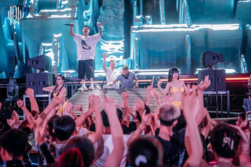 Professional DJ monitoring at Valley Beach Club features dedicated L-Acoustics A15 enclosures on KS21 subwoofers, delivering clear, powerful sound that cuts through the main professional sound system's massive output