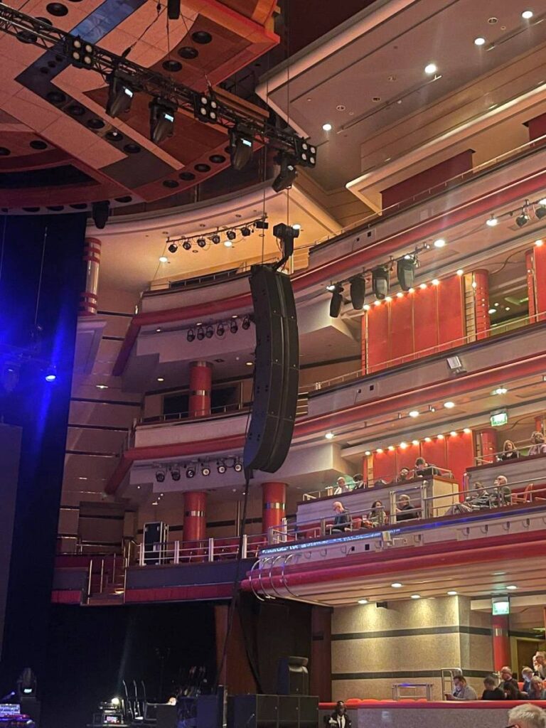 A closer view of the tour’s house-right loudspeaker array comprised of three L-Acoustics flown L2 concert sound system over a single L2D