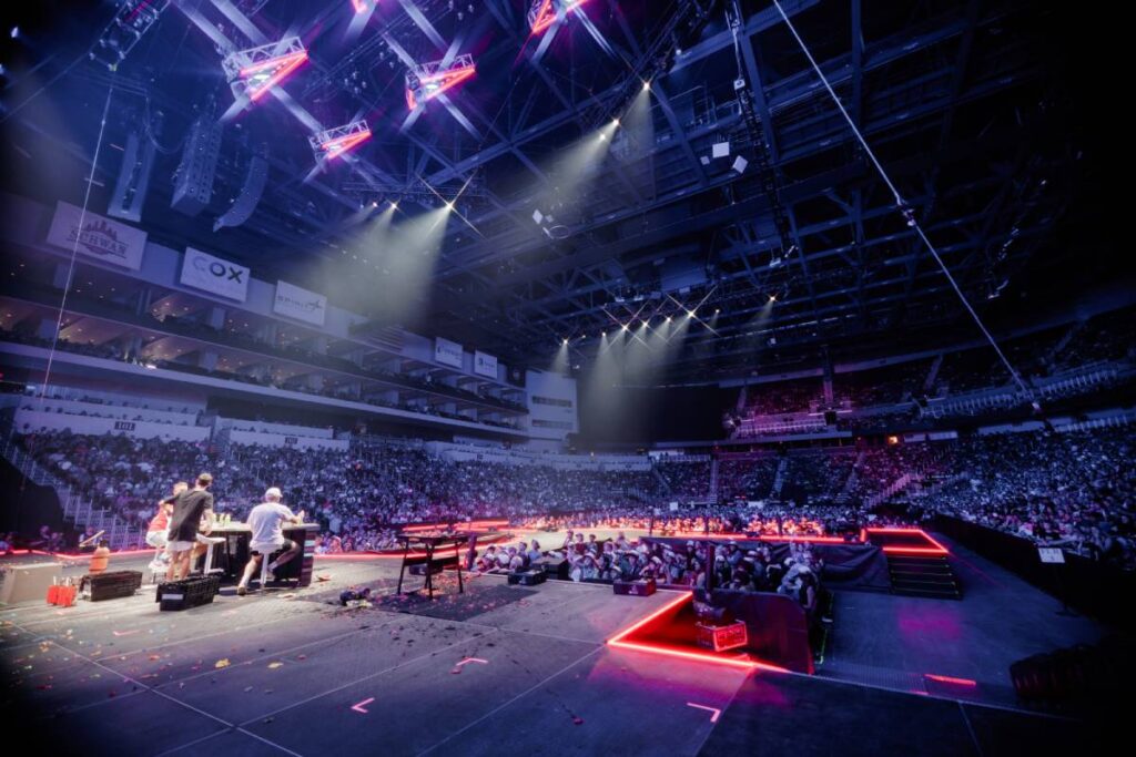 “This is five guys on wireless headset mics out in front of the PA, and we’re needing to get vocal clarity above a crowd that is screaming at 98 to 102 dB for most of the show,” describes FOH Engineer Jeff Sandstrom