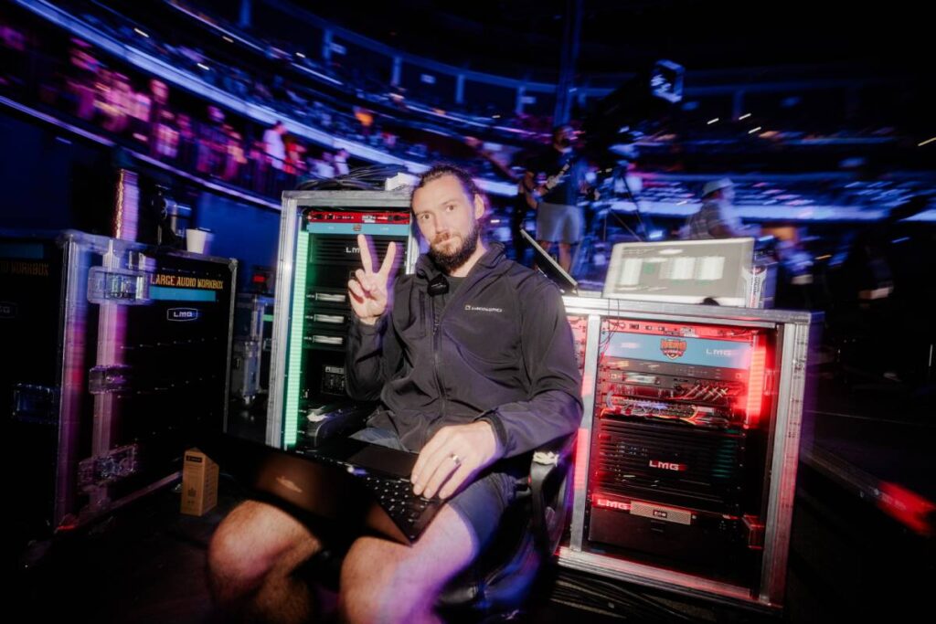 Systems Engineer Jacob Moore working on a Soundvision design while out on the Hero Tour