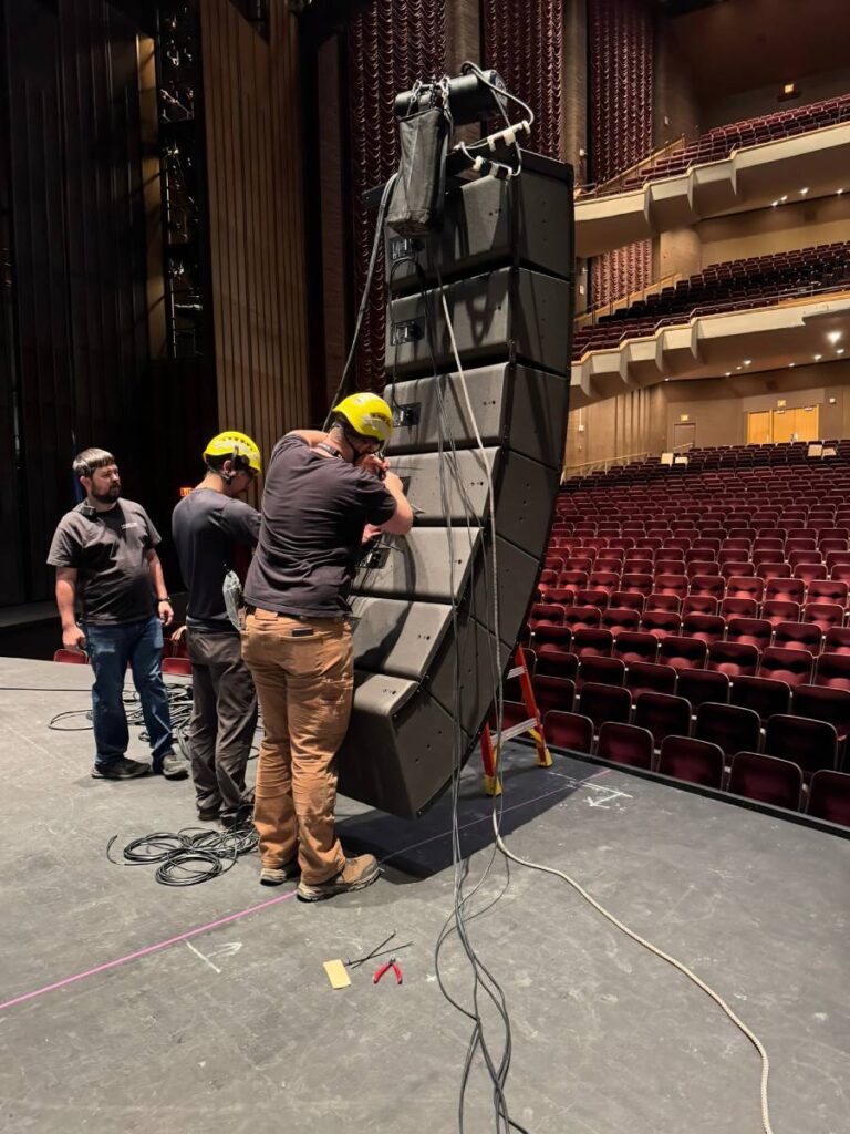 The Brown Note crew preparing to fly the hall’s new A15i center array