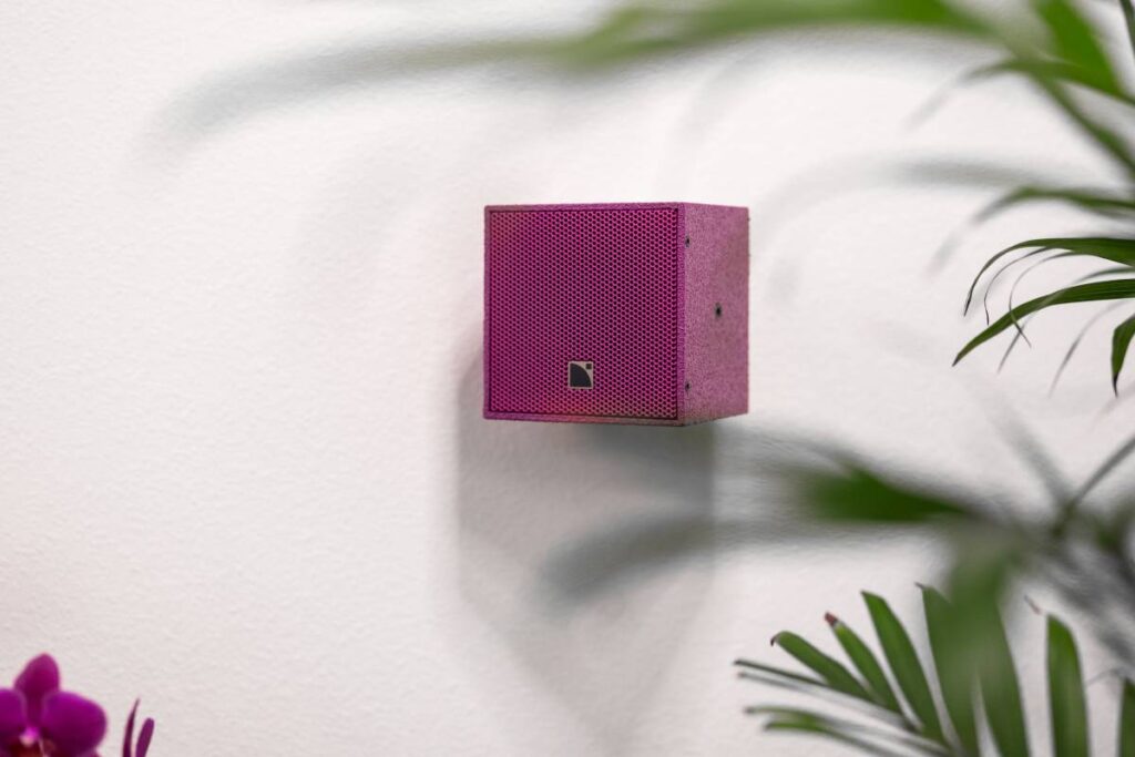 Ultra-compact X4i speaker in traffic purple.