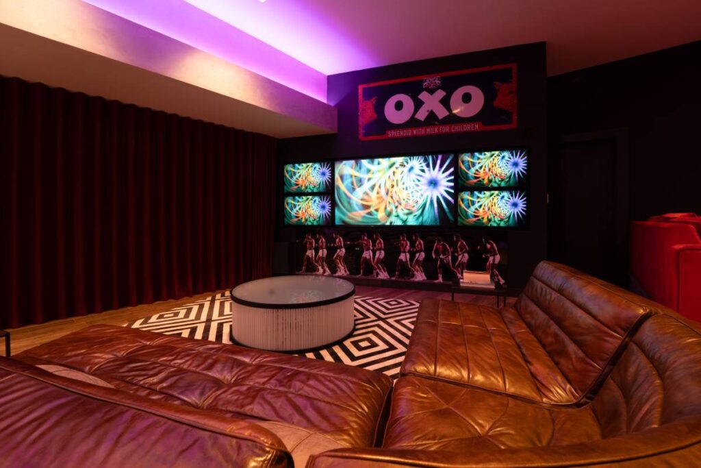 The system in the sports lounge delivers impactful audio for viewing parties and live sports screenings without dominating the visual space.