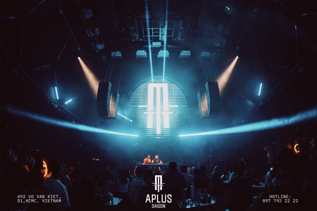 Compact L Series arrays preserve clear sight lines to the DJ booth while covering layered VIP terraces and elevated seating © Wang Tobi