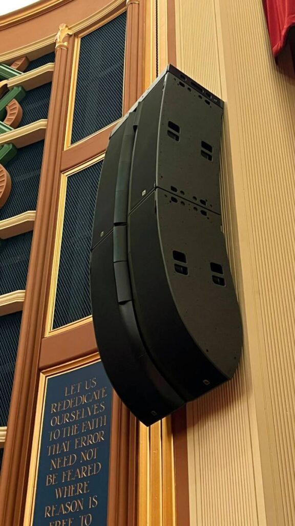 A close-up view of the room’s house-right L-Acoustics L2/L2D array