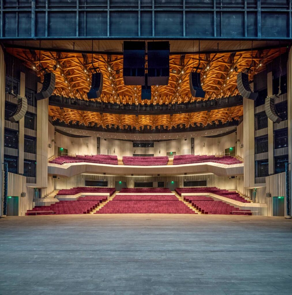 Opera Hall scene system features five hangs of 10 Kara IIi with side extension hangs and four KS28 subwoofers per set rigged centrally