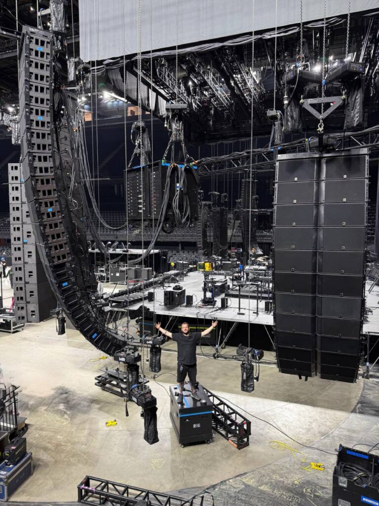 PA tech Juan Beilin flying the tour’s L-Acoustics loudspeaker arrays and amplified controllers