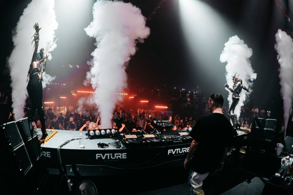 The DJ and stage monitor system comprises ground stacks of six Kara II and four SB18, supported by two X12