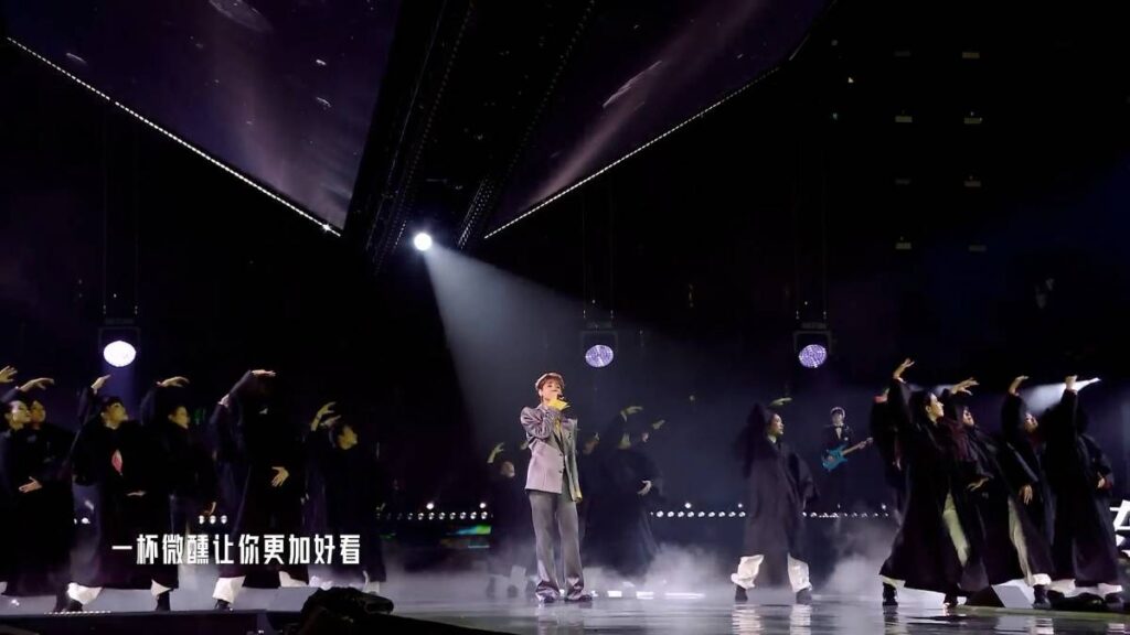 A bold production decision placed the main stage at the dead centre of the arena, surrounding performers with audience on all sides