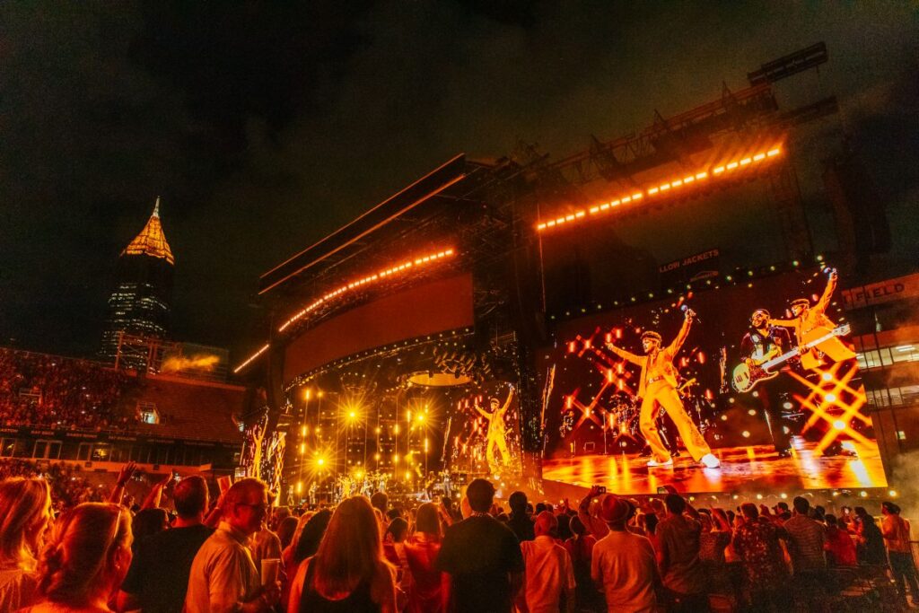 Bruno Mars performs at Bobby Dodd Stadium in Atlanta on The Romantic Tour, with L-Acoustics L1 deployed by Clair Global. Photo: Diwang Valdez