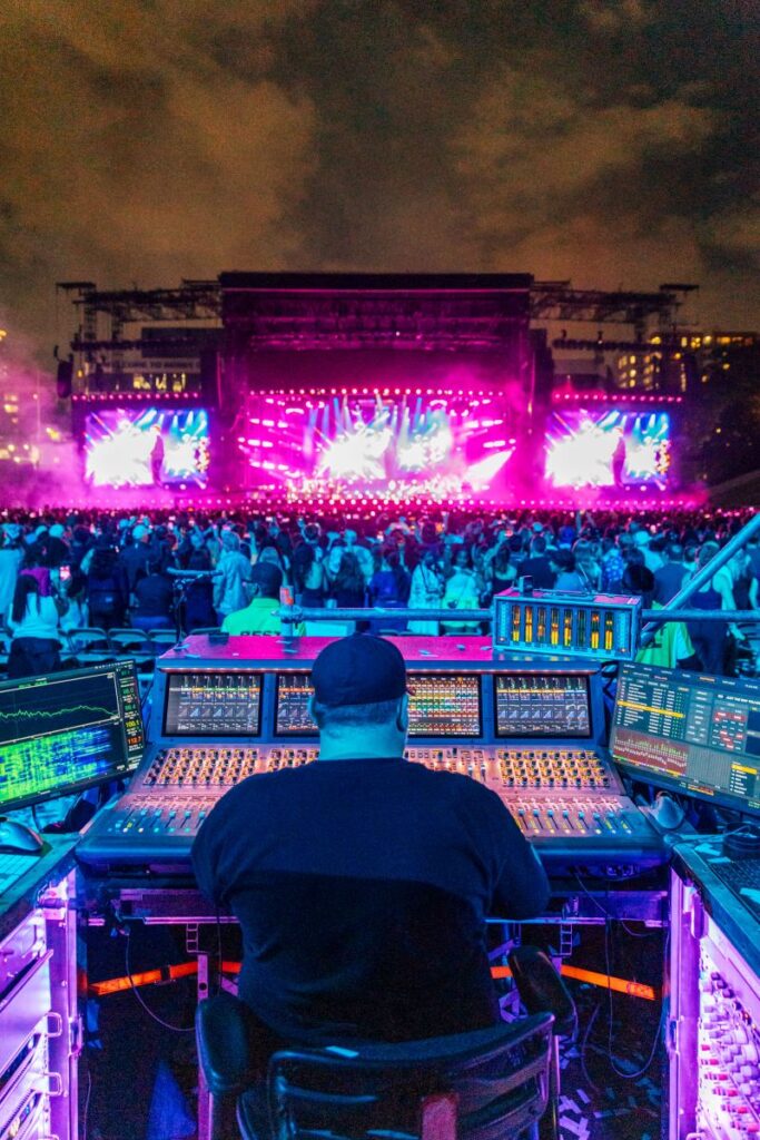 FOH engineer Sean "Sully" Sullivan at the mix position during Bruno Mars' The Romantic Tour at Bobby Dodd Stadium, Atlanta. Photo: Diwang Valdez