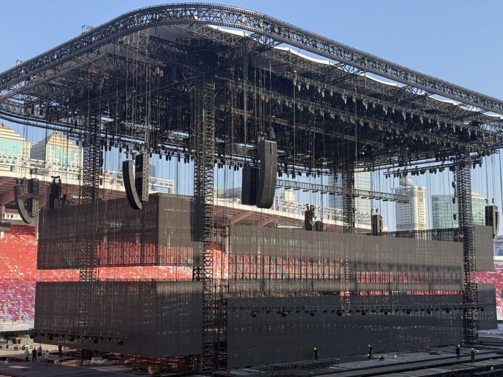 A full-stage view of Joker Xue's world tour shows L1, L1D, and CS1 configured across the main hangs, delivering the SPL and low-frequency control demanded by large-format touring productions.