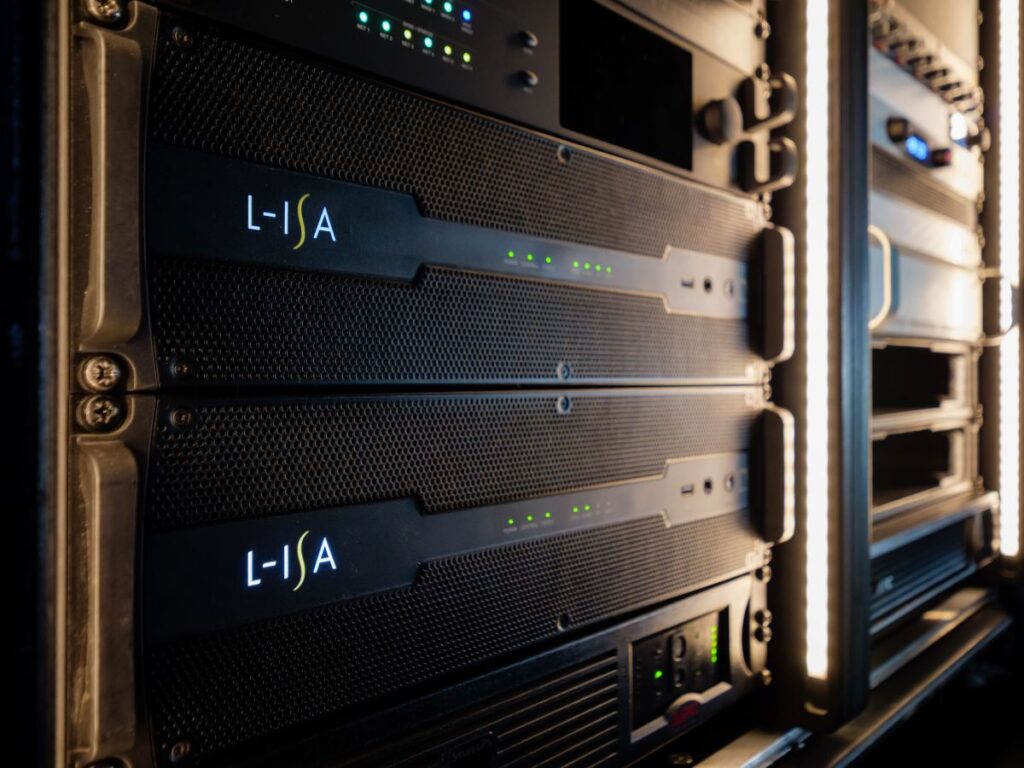 Source Intelligence runs exclusively on the L-ISA Processor II, the same platform that powers L-ISA Immersive Hyperreal Sound, L-Acoustics DJ, Ambiance, and HYRISS, with end-to-end latency of less than 8.5 ms over MADI and full PSU, network audio, and DSP redundancy.