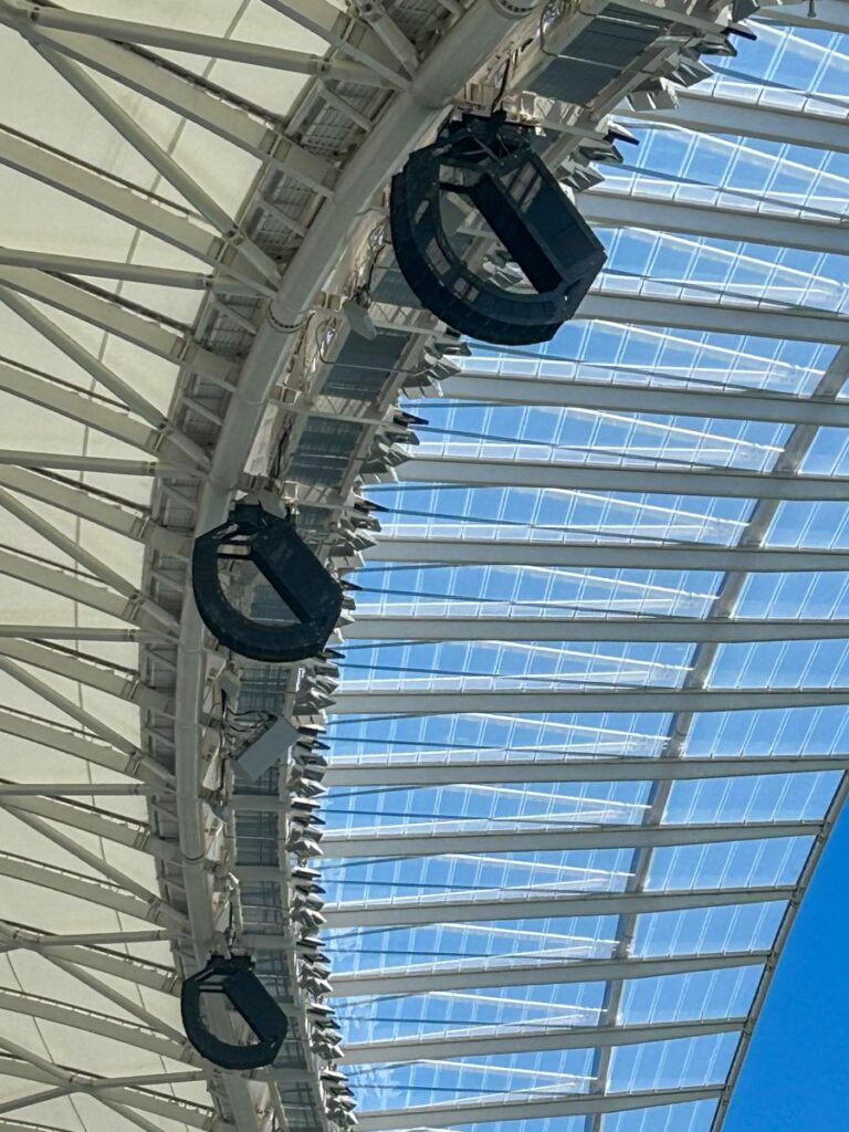The stadium bowl was divided into four quadrants, each served by five array types matched to seating geometry and roof height