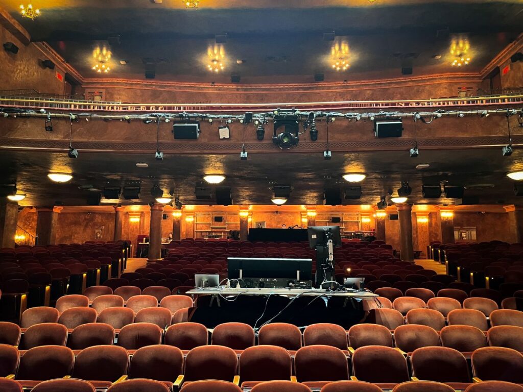 Thirty-four L-Acoustics X8 provide discrete immersive coverage across multiple seating zones spanning the full orchestra and both mezzanine levels