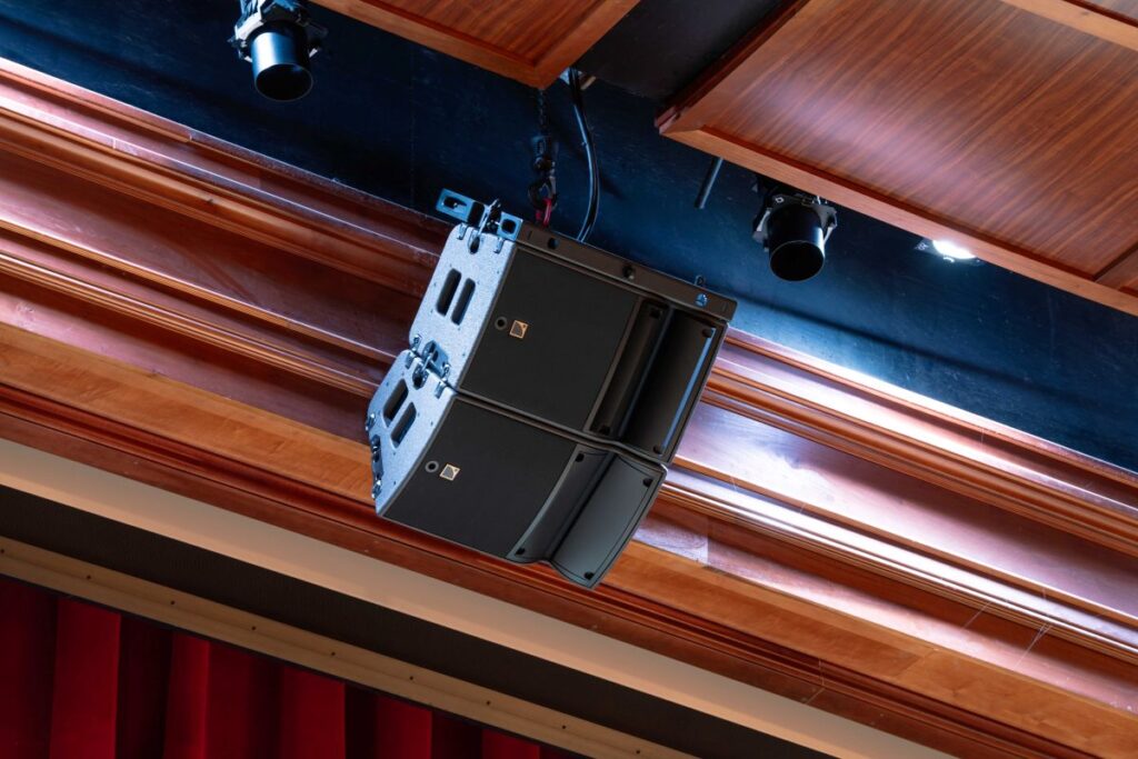 The room’s center-fill hang features one L-Acoustics A10 Focus enclosure over one A10 Wide