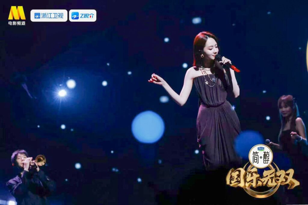 Guo Yue Wu Shuang is built on a single idea: one melody, two lives