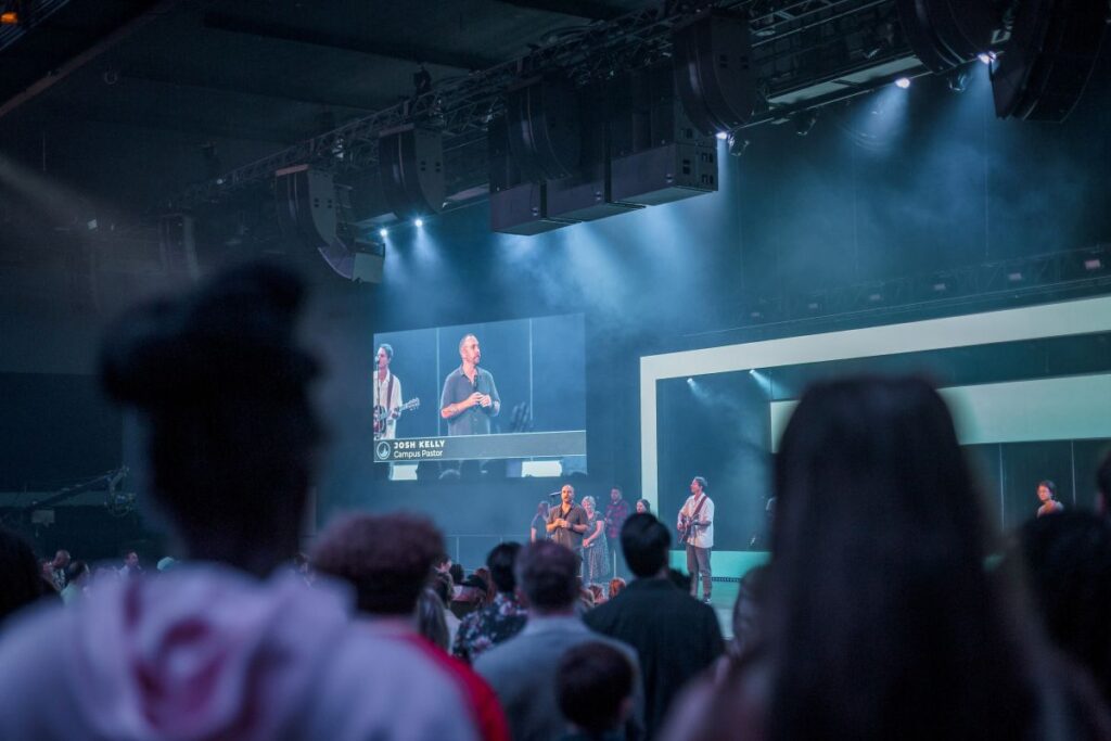 The room’s wide geometry shaped how the L-Acoustics sound system was configured, and the priority was to keep every listener inside the L-ISA zone