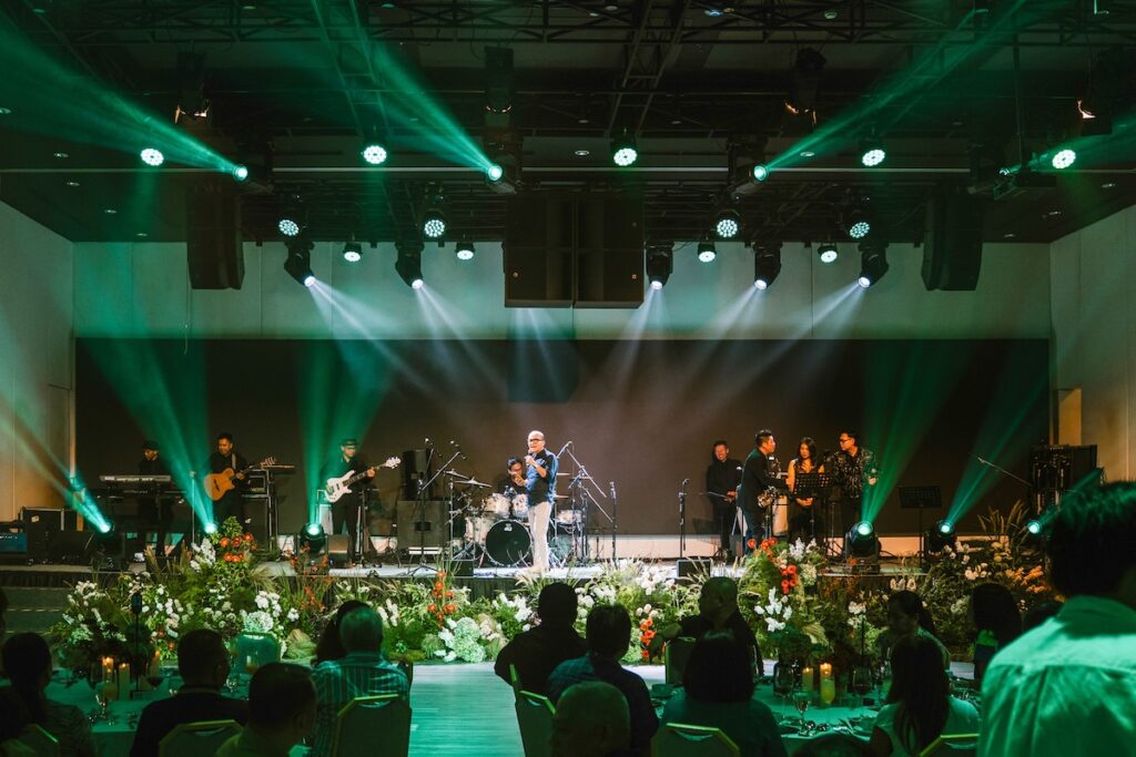 The L-Acoustics sound system serves the full room with clarity to carry speech and presentation, and the headroom to carry a band