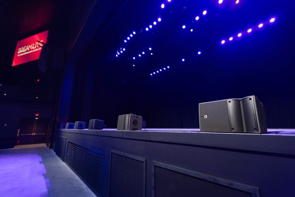 Front-fills consist of six L-Acoustics A10i Focus spread across the stage lip, with eight KS21i subs located under the stage