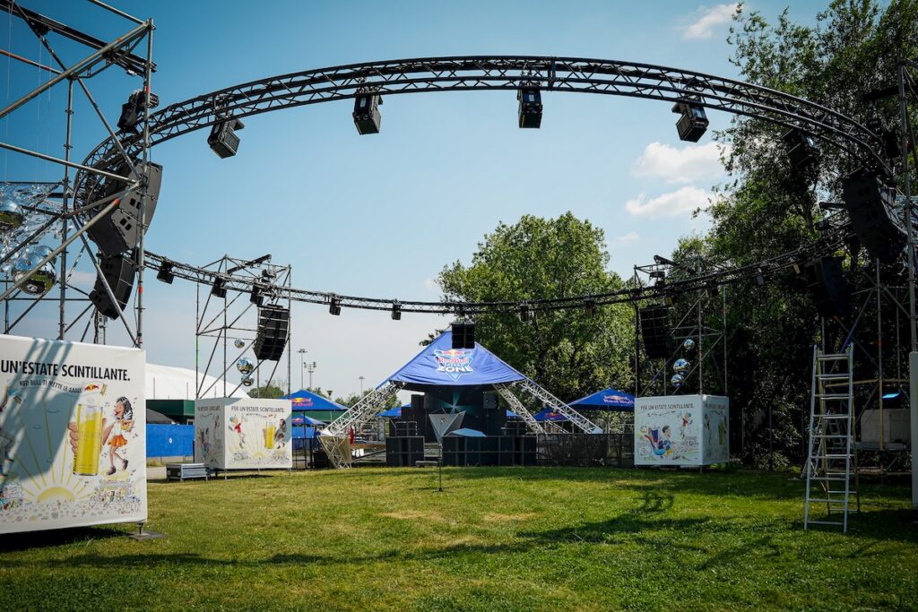 Seven L-Acoustics Kara II and A15 arrays on the 16 m ring truss, with eight KS28 subwoofers, wrap the Red Bull Energy Zone's in-the-round dance floor in spatial sound