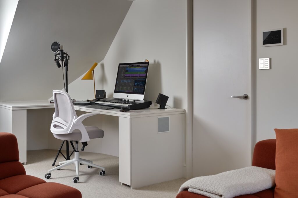 The integration of the recording studio required ingenuity as the rear rights needed to be moved as they were in the space where the client wanted the desk for the recording studio
